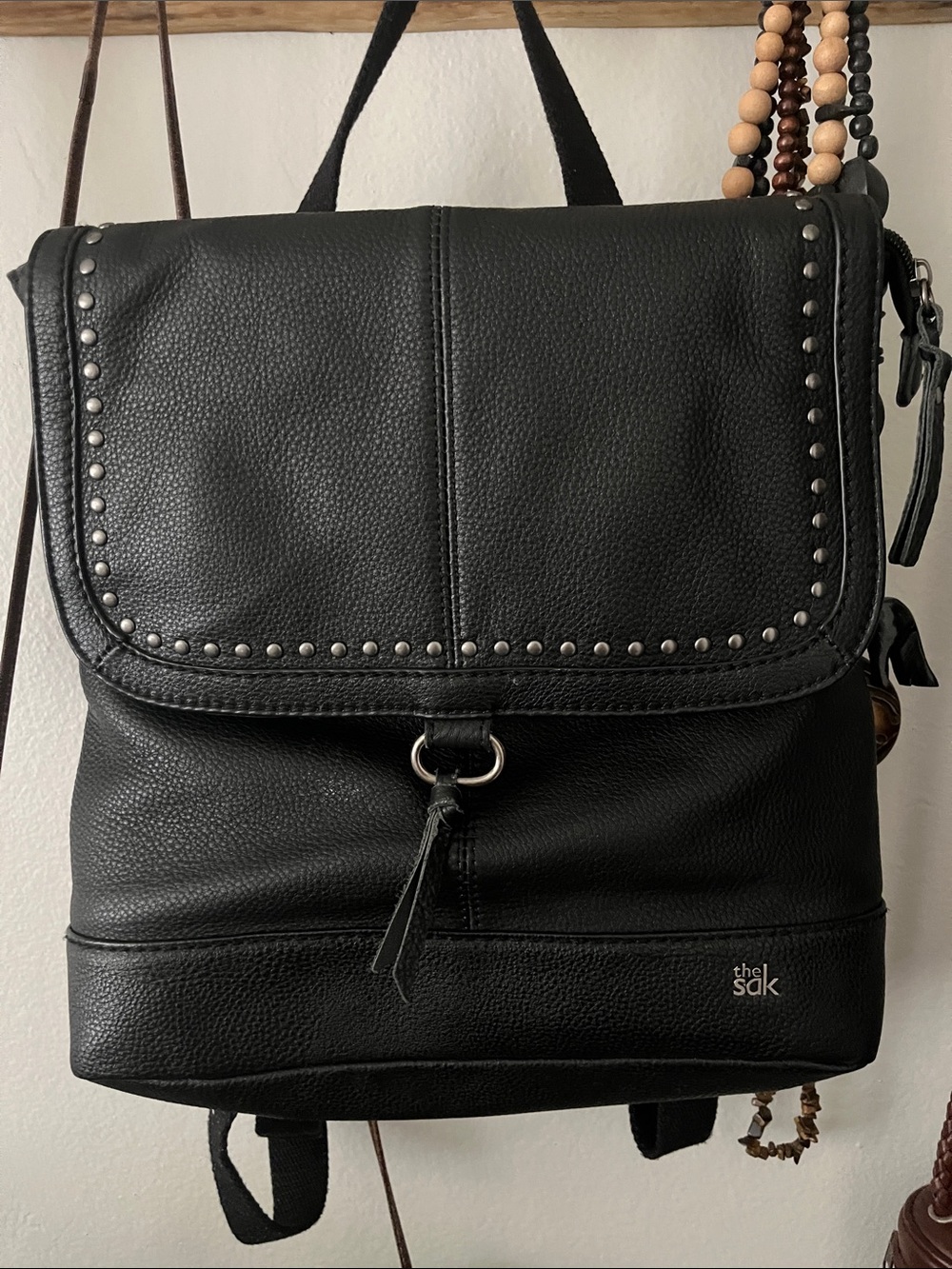 The Sak Black Pebbled Leather Studded Flap Backpack